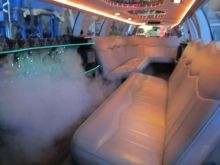 Fog machine and special lighting inside the limousine